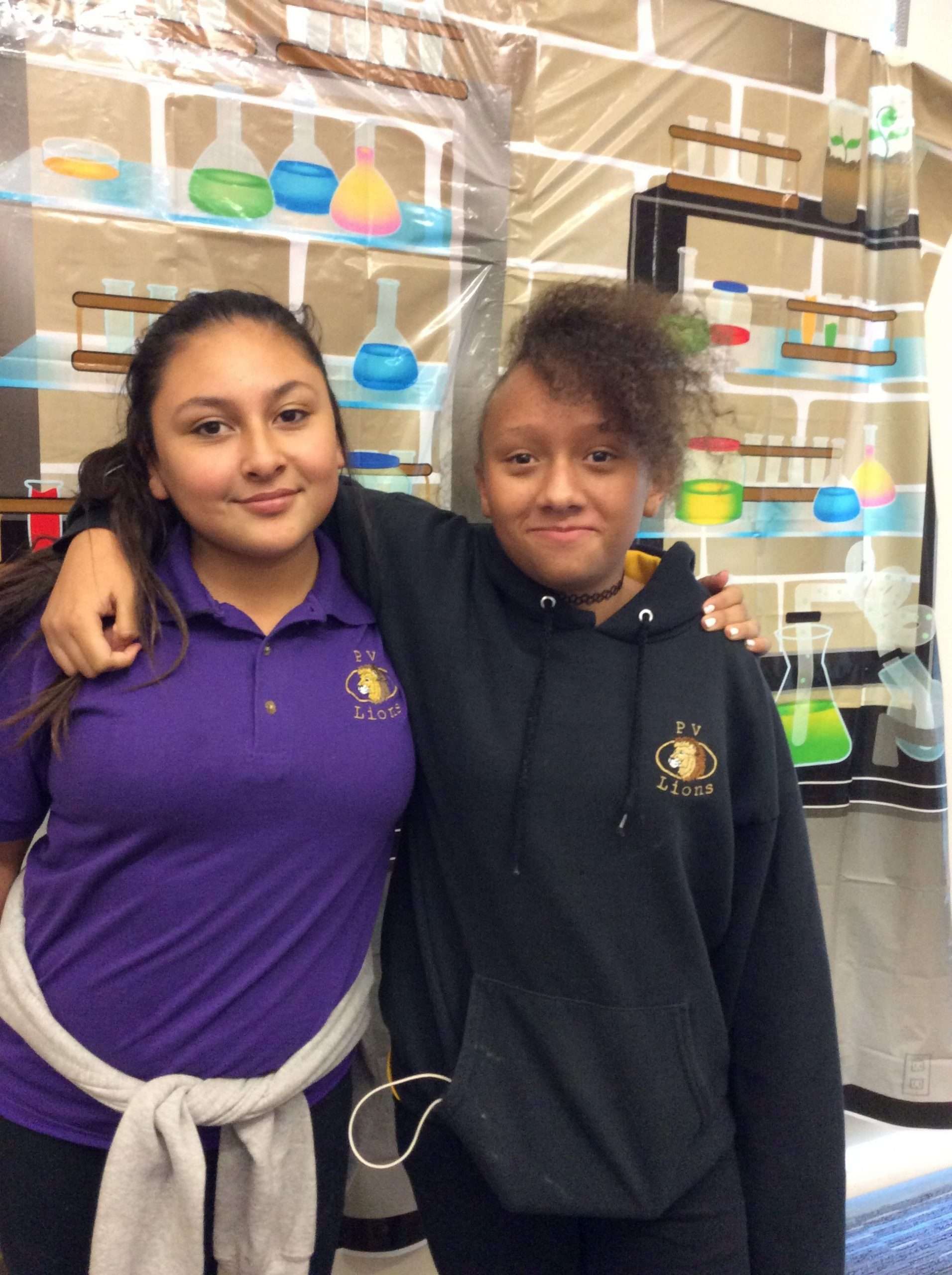 Two attendees at "Bring your friend to Teen Science Café night.